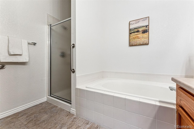 bathroom featuring vanity and an enclosed shower