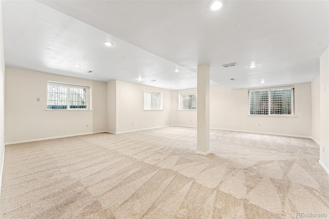 basement with light colored carpet