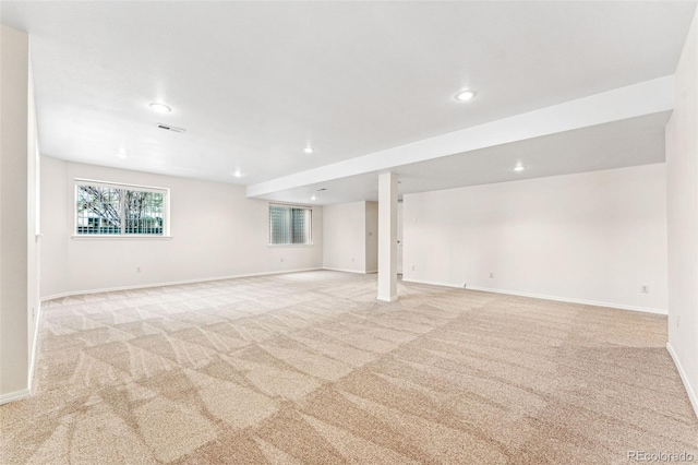 basement with light colored carpet