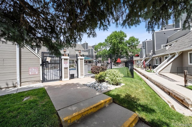 5250 S Huron Way Unit 1-204, Littleton, CO 80120 - view of property's community with a gate and a residential view