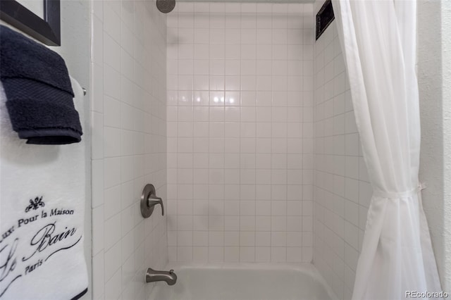 full bath featuring shower / bath combo with shower curtain