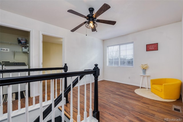 interior space featuring hardwood / wood-style flooring and washer / clothes dryer