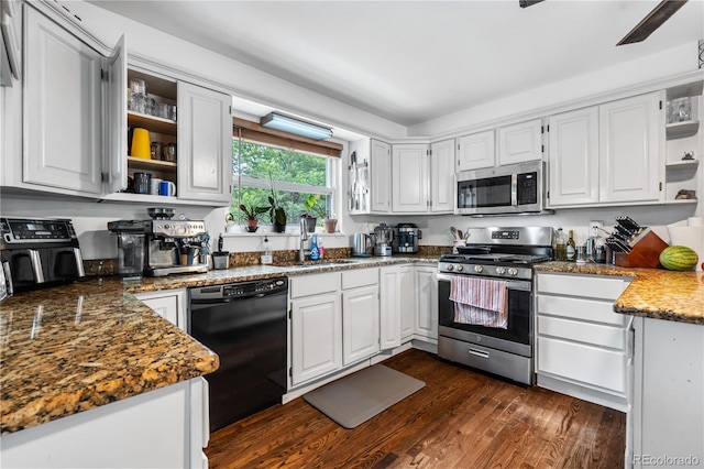 2730 S Jay St, Denver, CO 80227 - kitchen featuring open shelves, stainless steel appliances, dark wood-type flooring, and white cabinetry