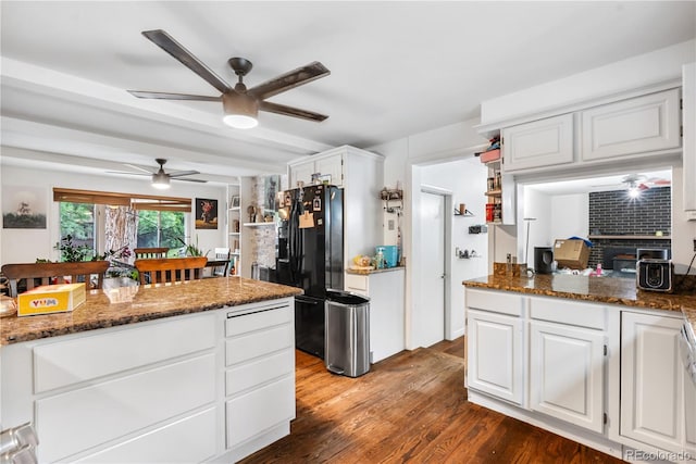 2730 S Jay St, Denver, CO 80227 - kitchen featuring a ceiling fan, white cabinetry, black fridge with ice dispenser, and dark wood-style floors