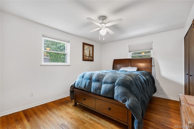 2730 S Jay St, Denver, CO 80227 - bedroom with wood finished floors and ceiling fan