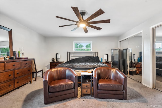 2730 S Jay St, Denver, CO 80227 - bedroom with light colored carpet, multiple windows, and a ceiling fan