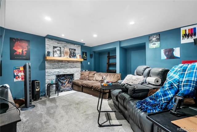 2730 S Jay St, Denver, CO 80227 - living room with carpet flooring, a stone fireplace, recessed lighting, and built in shelves