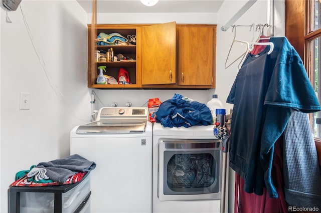 2730 S Jay St, Denver, CO 80227 - laundry area featuring washing machine and dryer and cabinet space