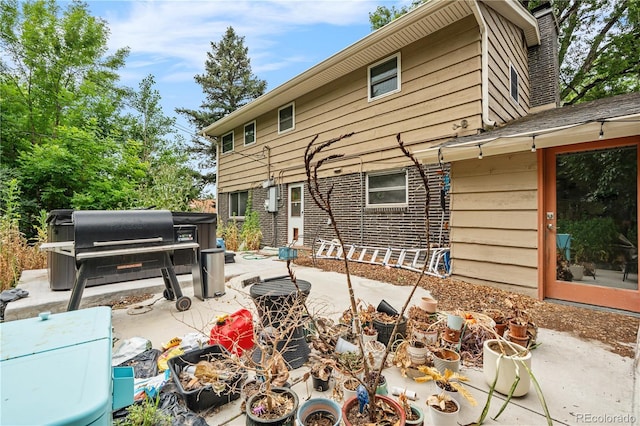 2730 S Jay St, Denver, CO 80227 - back of property with a patio area