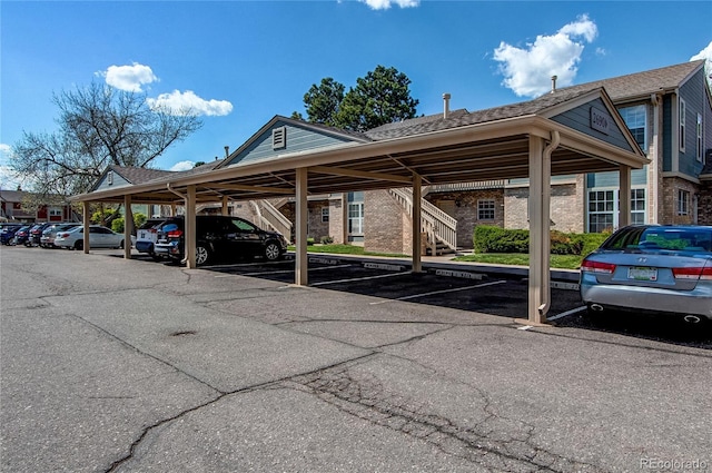 2690 E Otero Pl Unit 7, Centennial, CO 80122 - covered parking lot featuring stairway