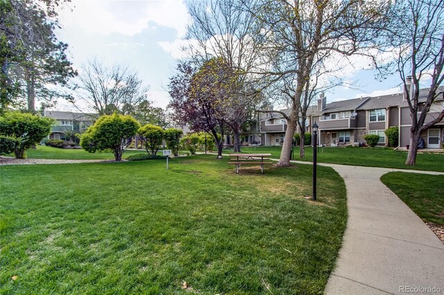 2690 E Otero Pl Unit 7, Centennial, CO 80122 - view of property's community featuring a lawn and a residential view