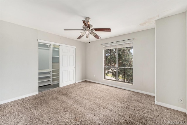 3550 S Harlan St Unit 105, Denver, CO 80235 - unfurnished bedroom with carpet floors, a closet, and a ceiling fan