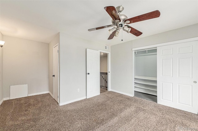 3550 S Harlan St Unit 105, Denver, CO 80235 - unfurnished bedroom with carpet floors, a ceiling fan, and a closet