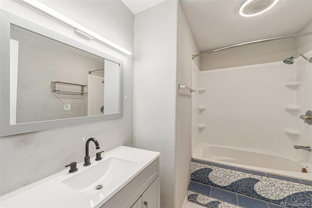 3550 S Harlan St Unit 105, Denver, CO 80235 - full bath with vanity and tiled shower / bath combo