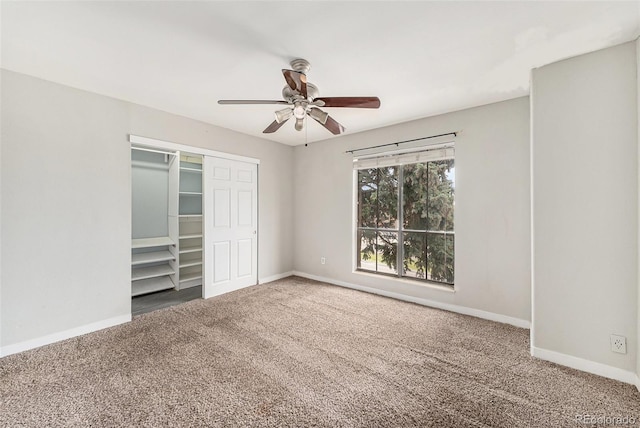 3550 S Harlan St Unit 105, Denver, CO 80235 - unfurnished bedroom with carpet, a closet, and ceiling fan