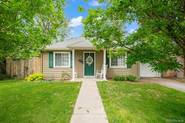1221 Ulster St, Denver, CO 80220 - bungalow-style house featuring concrete driveway and roof with shingles