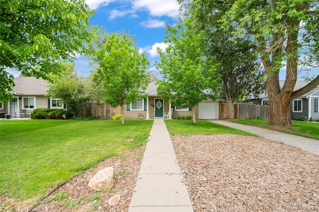 1221 Ulster St, Denver, CO 80220 - view of front of property featuring concrete driveway and a garage