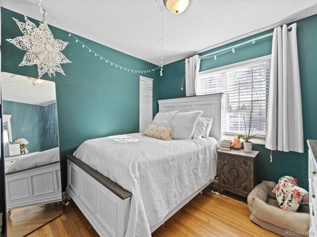 1221 Ulster St, Denver, CO 80220 - bedroom with wood finished floors