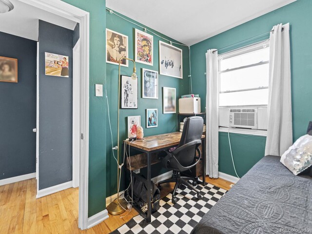 1221 Ulster St, Denver, CO 80220 - office area featuring baseboards, wood finished floors, and cooling unit