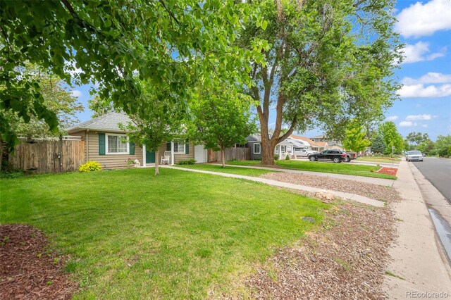 1221 Ulster St, Denver, CO 80220 - view of front of house featuring a shingled roof