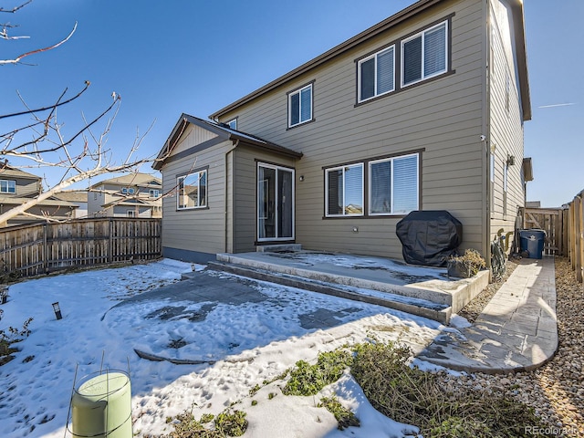 view of snow covered property