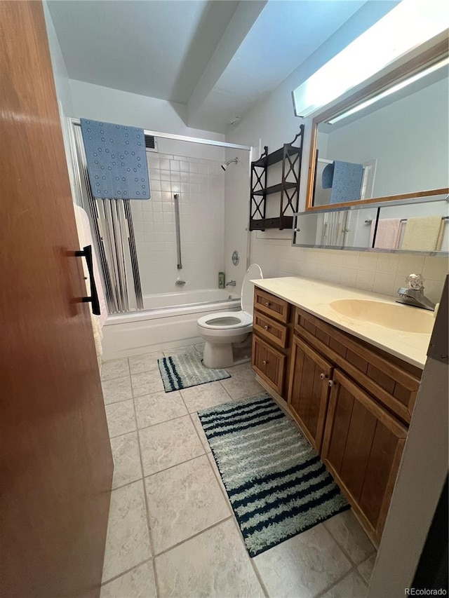 full bathroom featuring vanity, toilet, and shower / bath combination with curtain