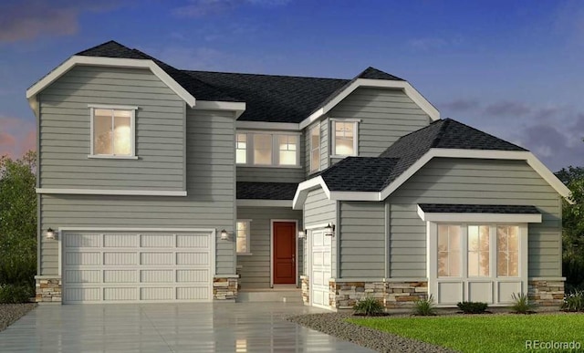 view of front of home with a garage