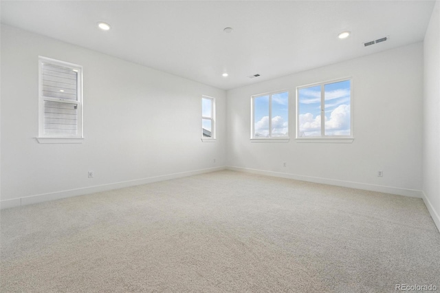 16549 Black Rose Cir, Parker, CO 80134 - spare room featuring baseboards, visible vents, recessed lighting, and light colored carpet