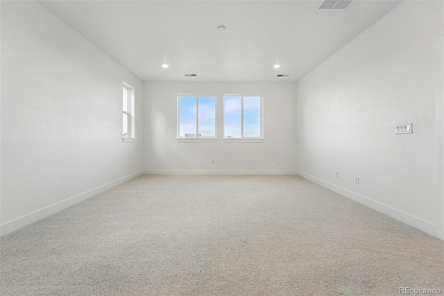 16549 Black Rose Cir, Parker, CO 80134 - spare room featuring baseboards, visible vents, and light colored carpet