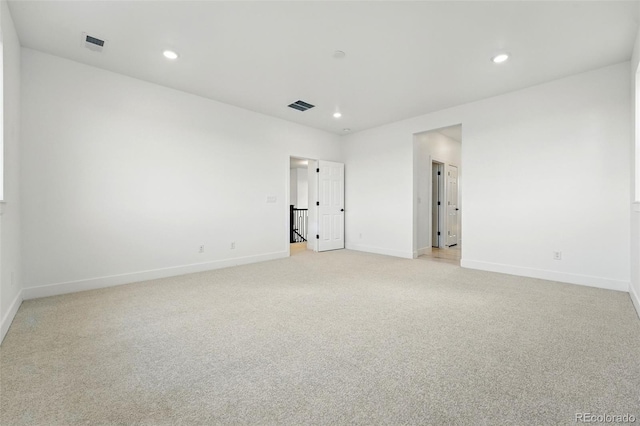 16549 Black Rose Cir, Parker, CO 80134 - spare room featuring recessed lighting, baseboards, light colored carpet, and visible vents