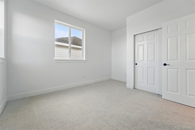16549 Black Rose Cir, Parker, CO 80134 - unfurnished bedroom with carpet flooring, a closet, and baseboards