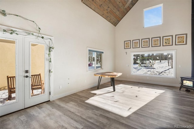 doorway featuring french doors, high vaulted ceiling, wooden ceiling, and wood-type flooring