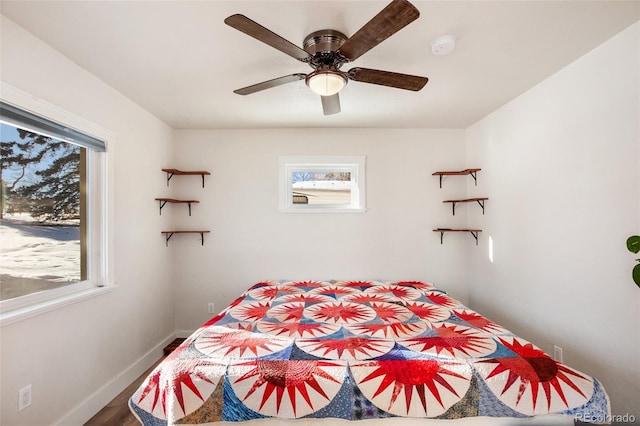 bedroom featuring hardwood / wood-style flooring and ceiling fan