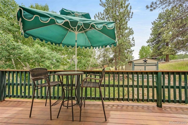 162 Pine Trl, Bailey, CO 80421 - wooden deck with an outdoor structure