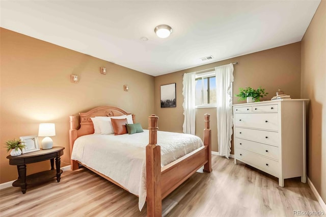 162 Pine Trl, Bailey, CO 80421 - bedroom with light wood-style floors