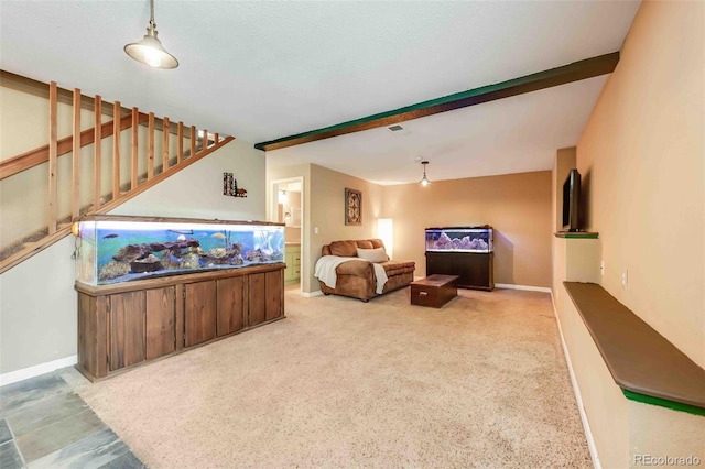 162 Pine Trl, Bailey, CO 80421 - carpeted living area featuring beam ceiling and stairway