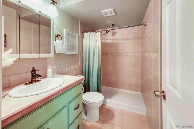 162 Pine Trl, Bailey, CO 80421 - full bath featuring vanity, tiled shower, and tile patterned floors