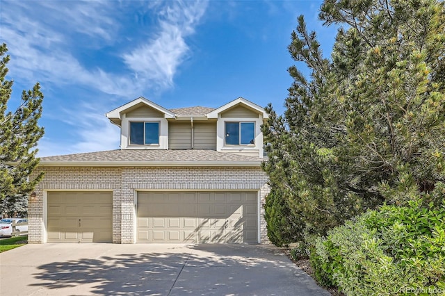 360 Morning Star Ln, Lafayette, CO 80026 - view of front of property with brick siding, driveway, roof with shingles, and an attached garage
