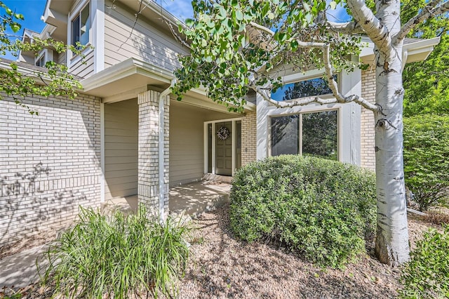 360 Morning Star Ln, Lafayette, CO 80026 - property entrance featuring brick siding