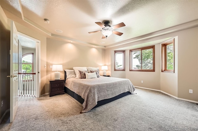 360 Morning Star Ln, Lafayette, CO 80026 - carpeted bedroom with a textured ceiling and ceiling fan
