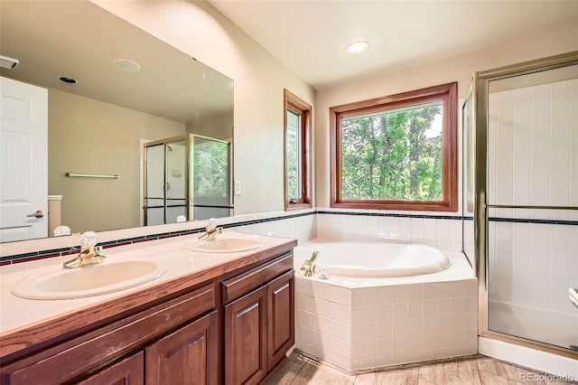 360 Morning Star Ln, Lafayette, CO 80026 - full bathroom featuring a shower stall, a bath, and double vanity