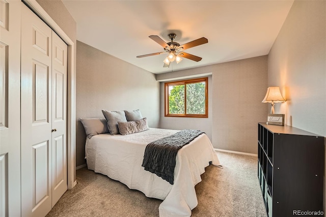 360 Morning Star Ln, Lafayette, CO 80026 - bedroom with light carpet, a ceiling fan, and a closet