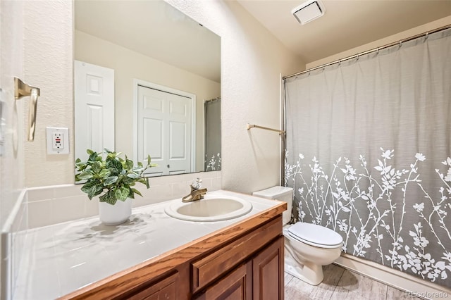 360 Morning Star Ln, Lafayette, CO 80026 - bathroom featuring vanity, a textured wall, and a shower with curtain