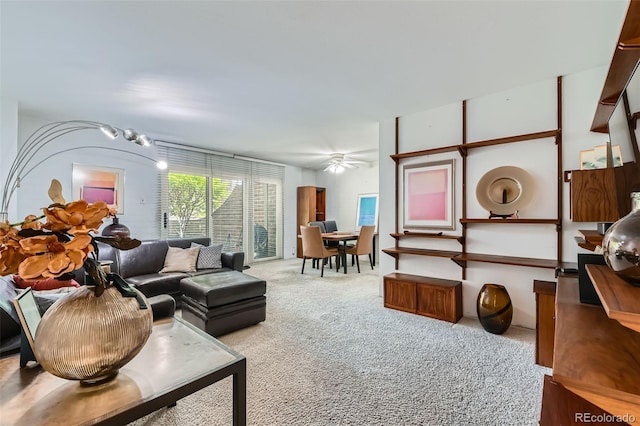 460 S Marion Pkwy Unit 102, Denver, CO 80209 - living area with carpet flooring and a ceiling fan