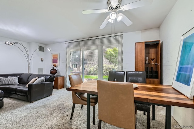 460 S Marion Pkwy Unit 102, Denver, CO 80209 - dining area featuring carpet floors and a ceiling fan