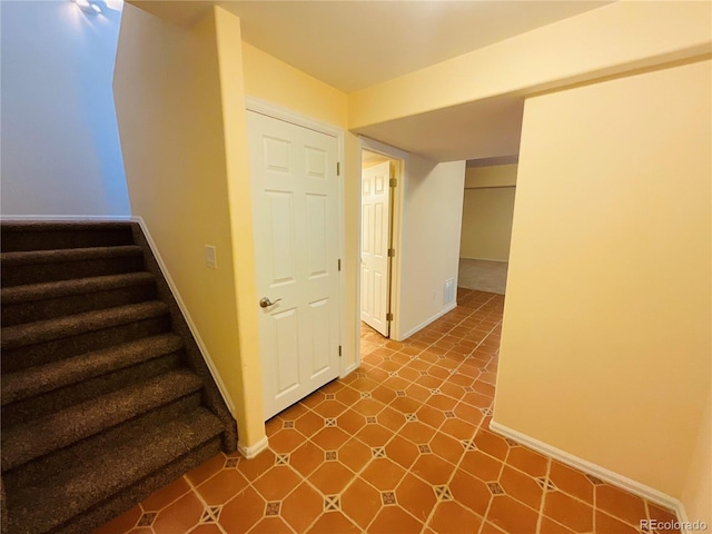 hall featuring tile patterned floors