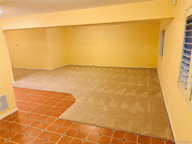 view of carpeted spare room