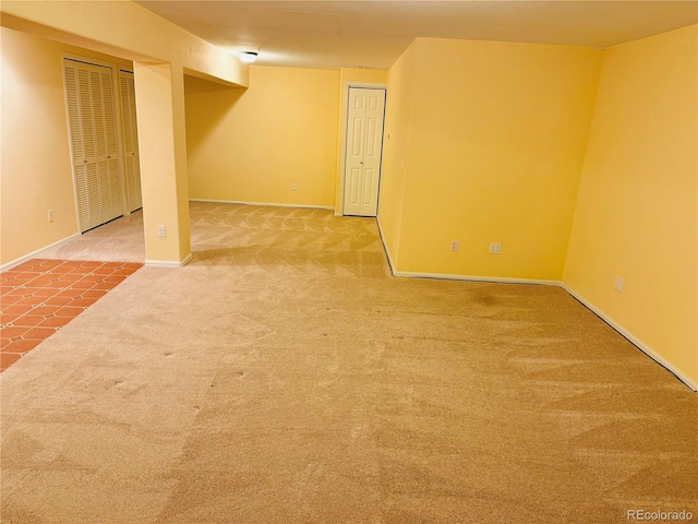 basement featuring carpet flooring