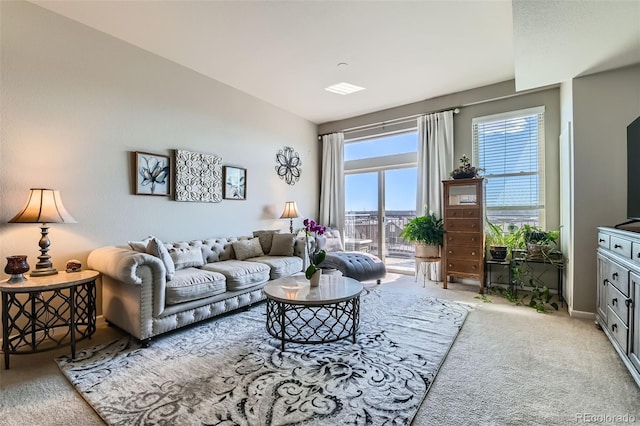 living area with carpet flooring