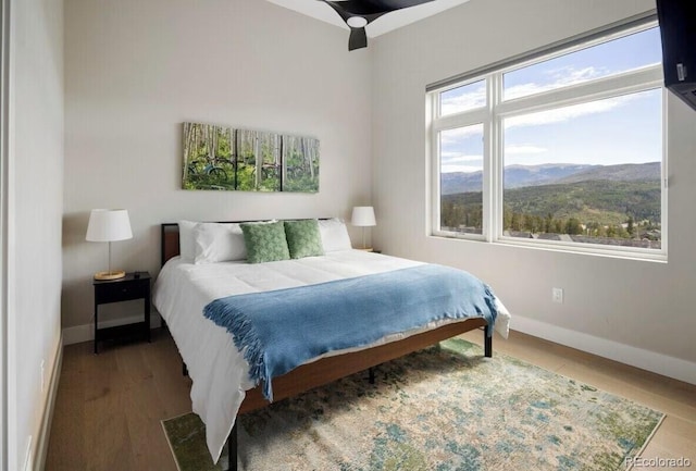 387 Bear Trl, Winter Park, CO 80482 - bedroom featuring wood finished floors and baseboards